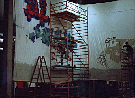 95qm Leinwand 1989. Ein Graffiti Projekt für Hans Böhrs Veranstalter Faschingsfest LiLaBe in der Fachhochschule Bergedorf/Hamburg. Projektausführung von der Mad Artists Cooperation, Siko Ortner und seinem Graffitischüler Wizz. Außerdem beteiligt waren Sis/Sige und Bibase/Base. Der Anfang ist gemacht 95qm Leinwand für Faschingsfest Lilabe 1989.
