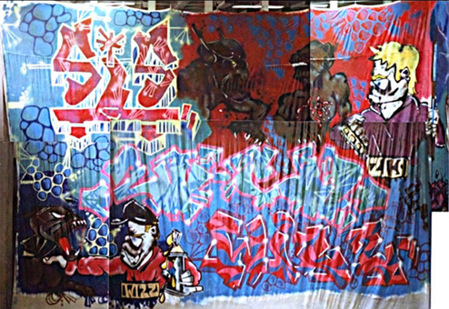 95qm Leinwand 1989. Ein Graffiti Projekt für Hans Böhrs Veranstalter Faschingsfest LiLaBe in der Fachhochschule Bergedorf/Hamburg. Projektausführung von der Mad Artists Cooperation, Zico/Siko Ortner und seinem Graffitischüler Wizz. Außerdem beteiligt waren Sis/Sige und Bibase/Base. Linke fertige Seite 95qm Leinwandgraffiti 1989.